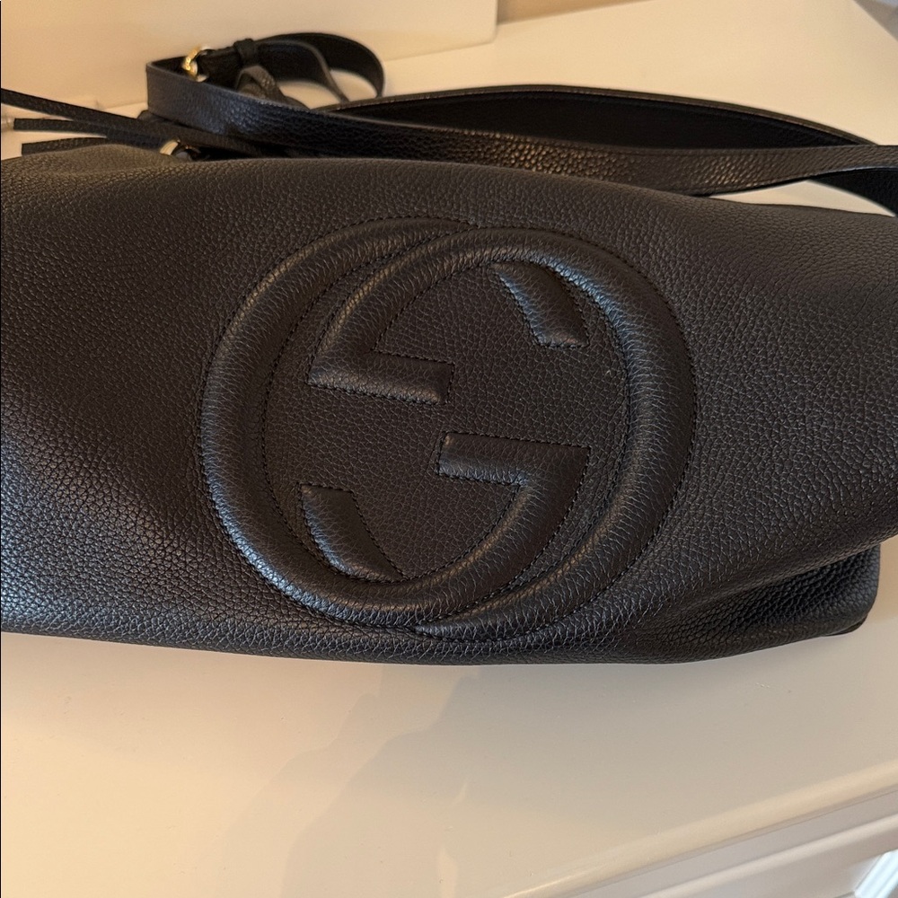 Gucci Black Crossbody Bag with Embossed Logo